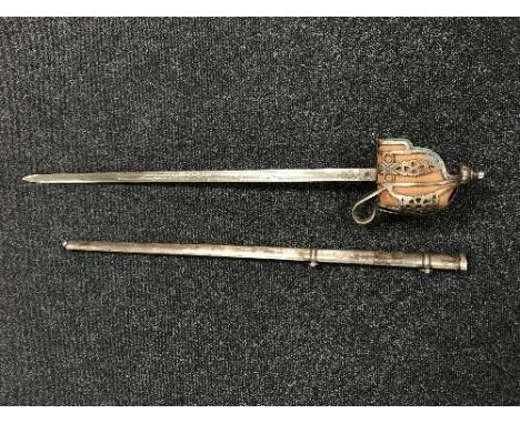A Victorian Scottish basket-hilted sword in scabbard