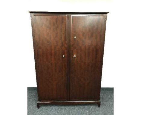 A mahogany Stag Minstrel double wardrobe
