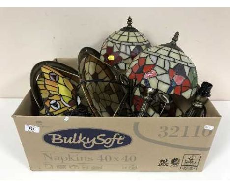 A box of three Tiffany style lamps with shades together with two light shades