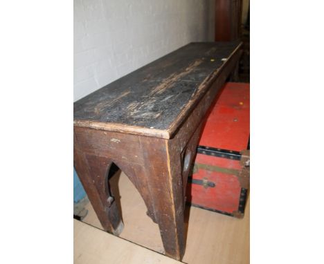 A PINE BENCH A/F. The dimentions of the bench are approx. 60cm high, 147cm wide, 42cm deep. The bench has many scratches and 