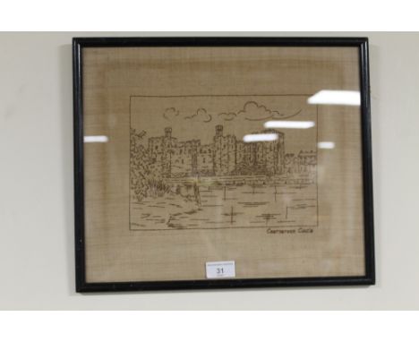 A FRAED AND GLAZED PRINT ON CANVAS OF CARNARVON CASTLE - 2593