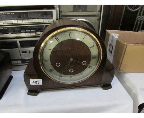 A Smith's 8 day Westminster chime mantel clock with pendulum and key