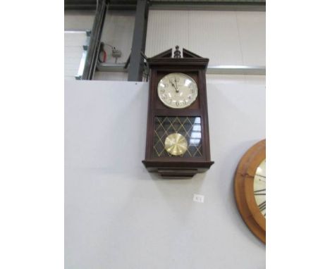 A quartz Westminster chime wall clock