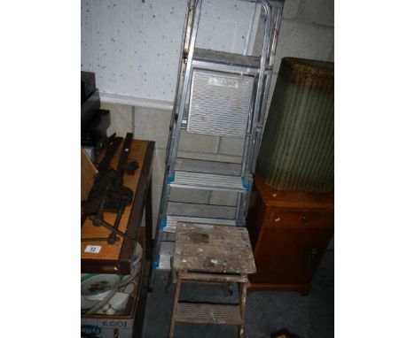2 aluminium step ladders and a wooden step ladder