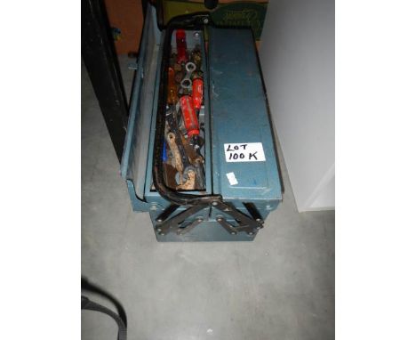 A metal tool box and tools