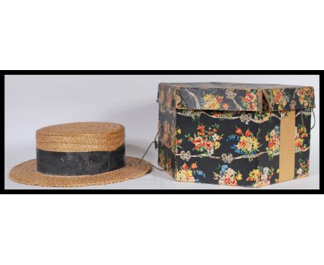 A mid 20th Century straw boater hat with black ribbon, Made in England by Dunn and Co, size 58. Together with a vintage 20th 