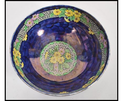 A vintage early 20th century Mailing lustre bowl in the Primrose pattern 6403. Raised on small circular foot with floral spra