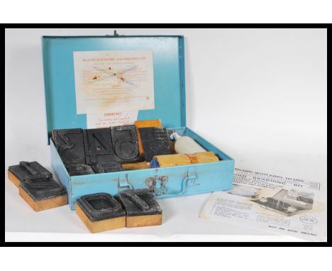 A vintage ' Dalton Kleermark ' cold cattle branding kit containing wooden and rubber block number stamps and branding liquid 