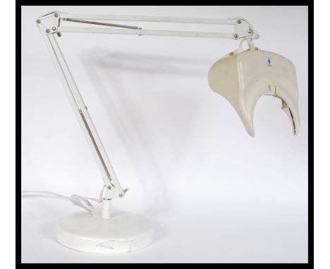 A vintage 20th century anglepoise style desk lamp raised on square base with adjustable neck and top.