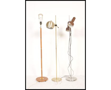 A group of vintage retro 20th Century lamps and lighting to include a brown twin spot lamp, retro standard lamp on circular b