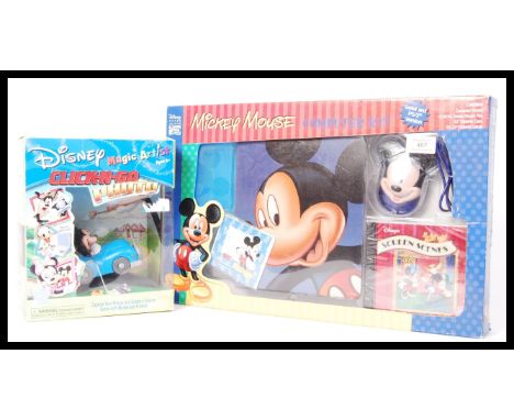 Two Disney ' Mickey Mouse ' computer accessories to include; Disney Magic Artist ' Click-N-Go Photo ' and Mickey Mouse Comput
