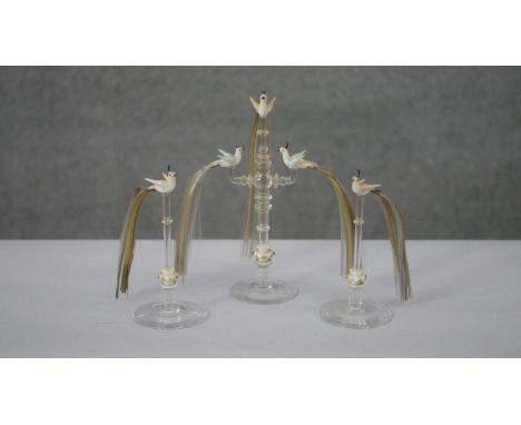 Three vintage Murano style lamp work glass bird figures with multicoloured fibre tails. One with three tropical birds on perc
