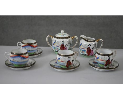 A vintage four person Lantern hand painted Japanese tea set. Makers stamp to the base. H.9 W.13cm (largest) 