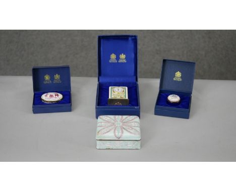 A collection of Halcyon Days enamels and an enamel trinket box. Including a Halcyon Days Verdi design desk clock with paperwo