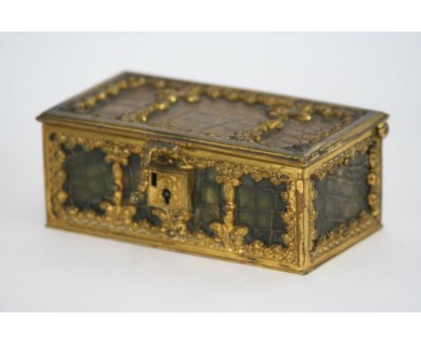 An ormolu mounted and crocodile skin covered trinket box, with velvet lined interior, 13.5cm long