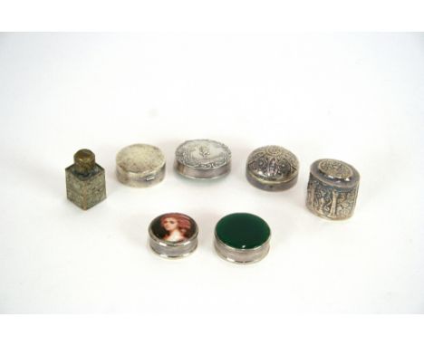 Six various silver and white metal patch boxes, and a scent bottle, (7)