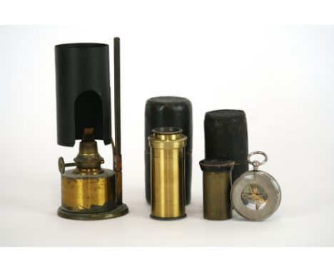Two pocket microscopes, in leather covered cases; a microscope lamp with adjustable wick and shade; and a plated pocket anero