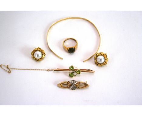 A 9ct gold and smoky quartz set dress ring; a 14ct gold bangle  AF; two bar brooches; and a pair of yellow metal and pearl se