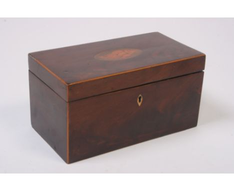 An early 19th Century mahogany and satinwood strung three compartment tea caddy, the hinged lid inset with a conch shell pate