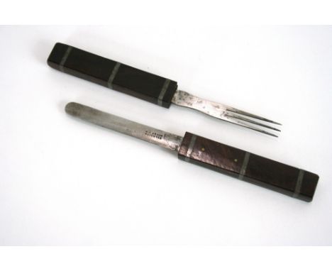 A 19th Century mahogany and steel travelling knife and fork set, by W.H. Ragg, 19cm