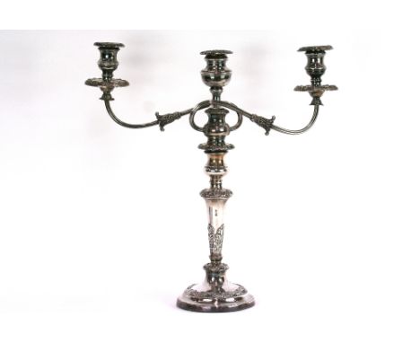 A Sheffield plated three light candelabrum, with foliate decorated scroll branches, 45.5cm high