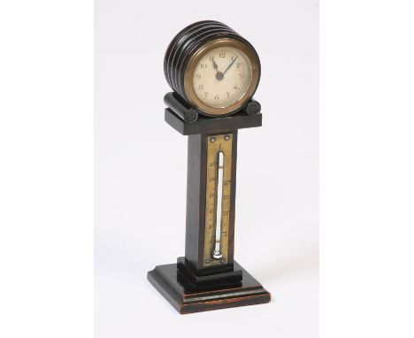 A late 19th Century rosewood cased and brass mounted clock barometer, of pedestal form, 23cm high