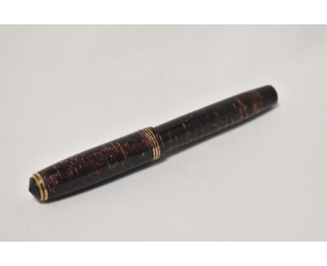 A Parker Vacumatic Standard button fill fountain pen in burgundy with three narrow bands to the cap having Parker 14k nib.