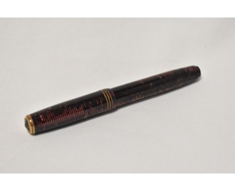 A Parker Vacumatic  button fill fountain pen in burgundy with three narrow bands to the cap having Parker 14k 20 nib.