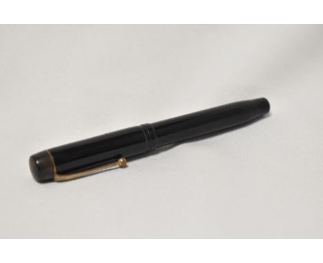 A Mentmore Diploma button fountain pen in black with single narrow band to the cap having Mentmore Osmi nib. cap band missing