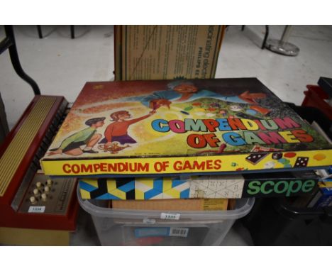 A shelf of vintage Games and Toys including Pendium of Games, Philips EE1003, Magic Robot, Waddington Formula 1, Computacar e