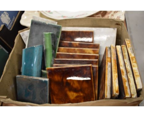 A selection of miscellaneous ceramic tiles, mainly mottled brown/treacle glaze, marked MAWCO to reverse