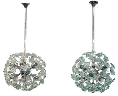 Manner of Fontana Arte, Pair of twelve light pendant lights, circa 1960, Chromed metal, glass, electrical fittings, Each 91cm