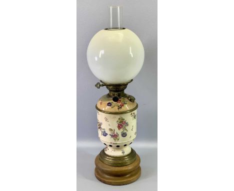 OIL LAMP - late 19th century French oil lamp, ceramic stem and removeable reservoir, floral decoration, circular wooden plint