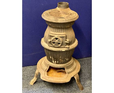 VINTAGE TYPE POT BELLY CAST IRON SOLID FUEL BURNER - on three splayed feet, 76cms overall H, 54cms max across, 56cms max D