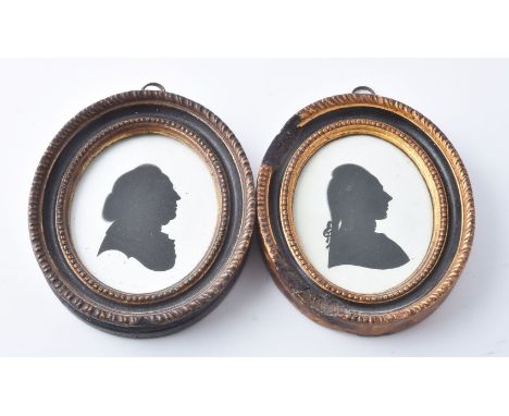John Miers (British, circa 1758-1821) Portrait of a gentleman   Portrait of a lady   Silhouette painted on plaster 8.5cm (3 3