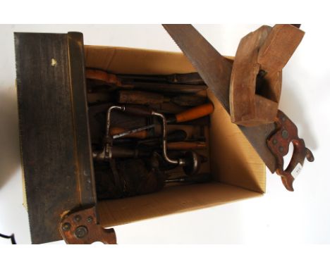 A collection of vintage wood working tools to include saws, drills, drill bits etc