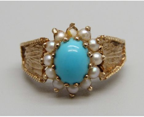 A 9ct gold, turquoise colour cabochon and seed pearl ring, 4.6g, O 