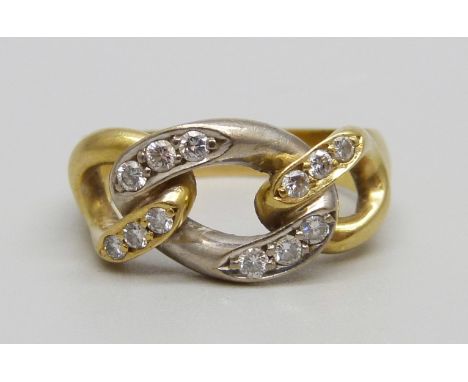 An 18ct gold and twelve stone diamond ring, 8.1g, R 