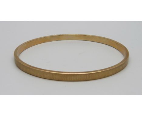 A 9ct rose gold bangle, Birmingham 1928, 6.8g, 69mm 