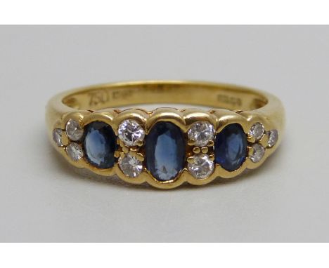 An 18ct gold, diamond and sapphire ring, 3.4g, M 