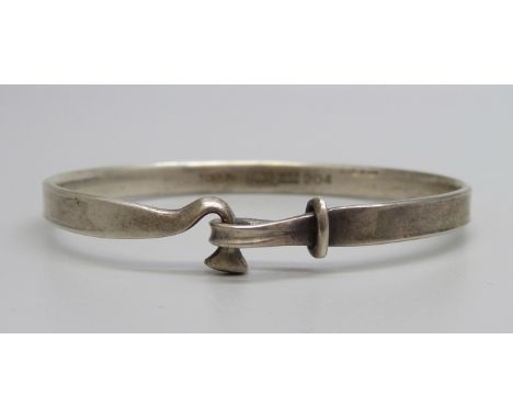 A silver Georg Jensen bangle, Torun, 204, (45mm x 56mm) 