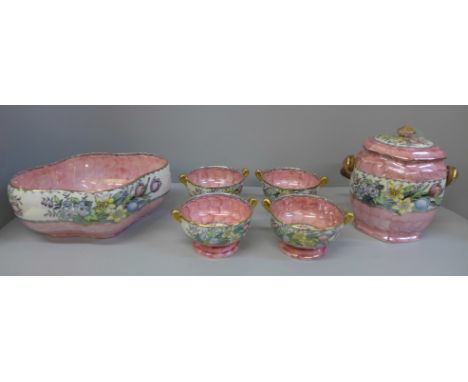 A Maling lustre bowl, a tea caddy and four matching bowls 