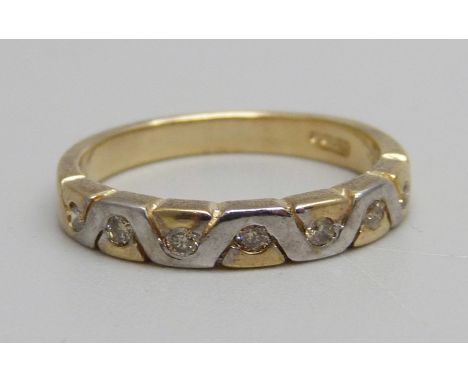 A 9ct gold and diamond half eternity ring, 2.6g, M 