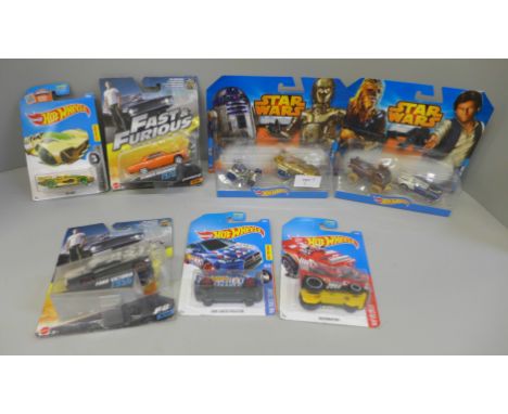 Five Hot Wheels model vehicles and two Mattel Fast and Furious and Star Wars, all packaged 