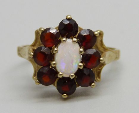 A 9ct gold, opal and garnet cluster ring, 2.5g, O 