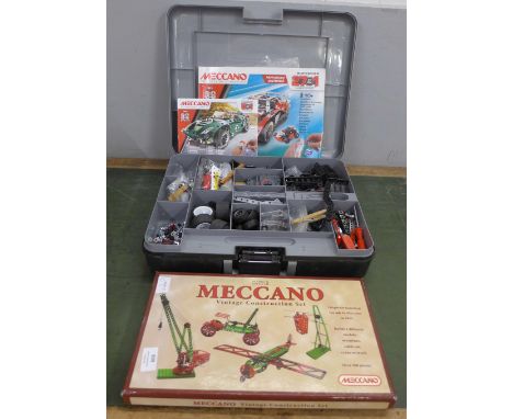 Two Meccano sets; a M&amp;S vintage construction set and one other vehicle set 