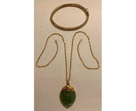 9ct GOLD BANGLE APPROXIMATELY 5.1g AND 9ct CHAIN WITH JADEITE HEART APPROXIMATELY 8.7g THE CLASP IS DEFICIENT ON THE CHAIN