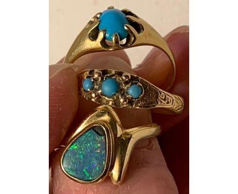 14ct GOLD BLACK OPAL RING. APPROX 3.5G, 22ct GOLD RING WITH THREE TURQUOISE COLOURED STONES. APPROX 2.7G, PLUS GOLD RING WITH