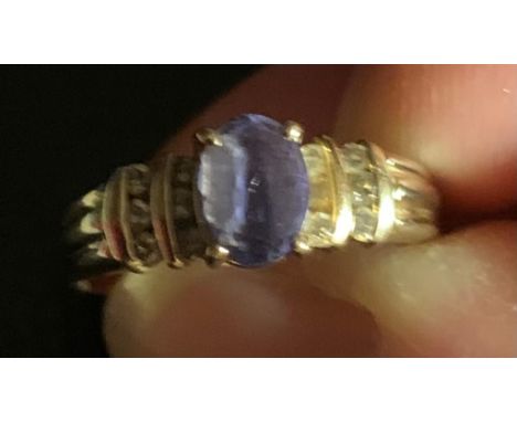 14ct GOLD RING SET WITH PURPLE TOURMALINE APPROX 1.5ct AND BRILLIANTS, SIZE Q, TOTAL WEIGHT APPROXIMATELY 3.6g