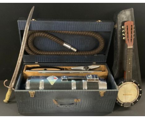A vintage Goblin 'Ace' vacuum cleaner with attachments in original wooden box.;  a banjolele, cased,  a French Chassepot 1866